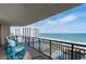Expansive balcony provides panoramic views of the ocean, beach, and community pool area at 8560 Queensway Blvd. # 1109, Myrtle Beach, SC 29572