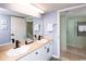 Bathroom featuring double sinks, modern fixtures, and a walk-in shower at 8560 Queensway Blvd. # 1109, Myrtle Beach, SC 29572