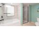 Bathroom showcasing a tub/shower, stand-alone shower, neutral tile, and updated finishes at 8560 Queensway Blvd. # 1109, Myrtle Beach, SC 29572