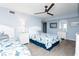 Inviting bedroom with coastal decor, two beds, dresser, and bedside table, perfect for a relaxing retreat at 8560 Queensway Blvd. # 1109, Myrtle Beach, SC 29572
