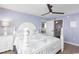 Comfortable bedroom with a queen-size bed and coastal-themed accents next to view of dining area and bathroom at 8560 Queensway Blvd. # 1109, Myrtle Beach, SC 29572