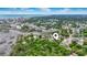 Aerial view of the property showcasing its proximity to the beach, surrounding neighborhood, and lush greenery at 908 Wood St., North Myrtle Beach, SC 29582