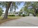 Inviting single-story home with a long drive and a detached garage at 908 Wood St., North Myrtle Beach, SC 29582