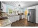 Gourmet kitchen featuring a stainless steel refrigerator and sleek countertops at 908 Wood St., North Myrtle Beach, SC 29582