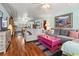 A cozy living room that opens into a kitchen and has lots of space at 908 Wood St., North Myrtle Beach, SC 29582