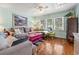 Comfortable living room with hardwood floors, and a ceiling fan at 908 Wood St., North Myrtle Beach, SC 29582