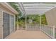 Inviting covered deck area perfect for outdoor seating, with a view of the backyard shed at 930 S Marlin Circle, Murrells Inlet, SC 29576