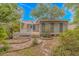 Picturesque backyard with a covered patio and well-kept landscaping at 930 S Marlin Circle, Murrells Inlet, SC 29576
