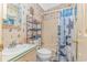 Bathroom with boat-themed wallpaper, shower and vanity at 930 S Marlin Circle, Murrells Inlet, SC 29576