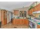 Traditional kitchen with wood cabinets and appliances at 930 S Marlin Circle, Murrells Inlet, SC 29576