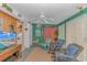 This sunroom is decorated in a tropical beach theme at 930 S Marlin Circle, Murrells Inlet, SC 29576