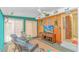 Bright sunroom with beach decor, comfortable seating and sliding doors at 930 S Marlin Circle, Murrells Inlet, SC 29576