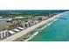 Expansive aerial view of beachfront condos along a coastline, blending urban living with serene seaside charm at 9501 Shore Dr. # A-211, Myrtle Beach, SC 29572