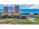 Picturesque aerial view of condo buildings near the ocean and inter-coastal waterway, showcasing a prime coastal location at 9501 Shore Dr. # A-211, Myrtle Beach, SC 29572