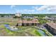Scenic aerial view of charming condos nestled amid lush landscapes and tranquil waterways, offering a serene escape at 9501 Shore Dr. # A-211, Myrtle Beach, SC 29572