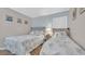 Inviting bedroom showcasing two twin beds with serene blue accents, complemented by beach-themed artwork at 9501 Shore Dr. # A-211, Myrtle Beach, SC 29572