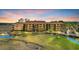 Beautiful exterior view of condo complex and intercoastal waterway at sunset at 9501 Shore Dr. # A-211, Myrtle Beach, SC 29572