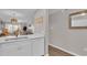 The kitchen features a stainless dishwasher, and sink overlooking the open floor plan at 9501 Shore Dr. # A-211, Myrtle Beach, SC 29572