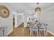 Open concept living room and kitchen featuring hardwood floors and updated decor at 9501 Shore Dr. # A-211, Myrtle Beach, SC 29572