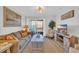 Inviting living room features comfortable seating, stylish decor, and sliding glass doors to a private balcony at 9501 Shore Dr. # A-211, Myrtle Beach, SC 29572