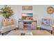 Cozy living room with comfortable seating, a modern entertainment center, and a beach-themed television display at 9501 Shore Dr. # A-211, Myrtle Beach, SC 29572