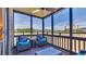 Inviting screened-in porch featuring comfortable seating and picturesque views of the surrounding landscape at 9501 Shore Dr. # A-211, Myrtle Beach, SC 29572
