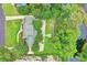 Aerial view of the property with landscaping and tree lined backyard, plus a long driveway at 966 Waterway Ln., Myrtle Beach, SC 29572