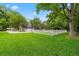 Spacious backyard with lush greenery and a classic white picket fence at 966 Waterway Ln., Myrtle Beach, SC 29572