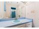 Charming bathroom with blue fixtures, boat wallpaper, and a glass-enclosed shower at 966 Waterway Ln., Myrtle Beach, SC 29572