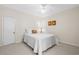 Bedroom decorated with white decor and a door allowing easy access to other rooms at 966 Waterway Ln., Myrtle Beach, SC 29572