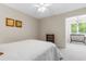 Cozy bedroom featuring carpeted floors and light-filled doorway to another room at 966 Waterway Ln., Myrtle Beach, SC 29572