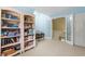 Bonus room with a bookshelf, a floral sofa and French doors at 966 Waterway Ln., Myrtle Beach, SC 29572
