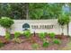 Stone sign for The Forest at Briarcliffe with lush landscaping in a wooded area at 966 Waterway Ln., Myrtle Beach, SC 29572