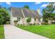 Well-maintained single-story home featuring manicured lawn and a concrete driveway at 966 Waterway Ln., Myrtle Beach, SC 29572