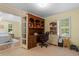 Office with built-in desk, hutch, and shelving for optimal organization and productivity at 966 Waterway Ln., Myrtle Beach, SC 29572