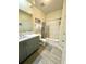 Bright bathroom with a modern vanity, updated fixtures, and a shower-tub combination at 9780 Leyland Dr. # 112, Myrtle Beach, SC 29572