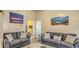 Inviting living room area with comfortable seating and beach-themed decor at 9780 Leyland Dr. # 112, Myrtle Beach, SC 29572