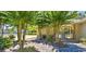 Charming walkway and mature trees leading to the community pool area at 9780 Leyland Dr. # 112, Myrtle Beach, SC 29572