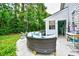 Backyard patio featuring comfortable seating and lush green surroundings at 990 Palisade Circle, Myrtle Beach, SC 29577