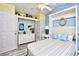 Charming bedroom with a Murphy bed, stylish decor, and a window, creating a cozy and inviting space at 990 Palisade Circle, Myrtle Beach, SC 29577