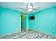 Clean bedroom featuring a fan, wall-mounted TV, and closet at 990 Palisade Circle, Myrtle Beach, SC 29577