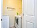 Functional laundry room with a washing machine and dryer for convenient laundry care at 990 Palisade Circle, Myrtle Beach, SC 29577