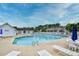 Community pool with ample seating, providing a resort-like experience at 990 Palisade Circle, Myrtle Beach, SC 29577
