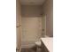 Bathroom featuring a shower-tub combination with white tile surround, toilet, and vanity at Tbd Aft Ct # 101, Murrells Inlet, SC 29576
