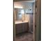 Bathroom with tiled shower and glass door, light gray cabinets, and updated fixtures at Tbd Aft Ct # 101, Murrells Inlet, SC 29576