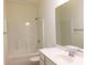 Bathroom featuring a shower-tub combo, toilet, and a single sink vanity with mirror at Tbd Aft Ct # 101, Murrells Inlet, SC 29576