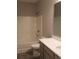 Bathroom with tub-shower, white fixtures, gray vanity, and modern finishes at Tbd Aft Ct # 101, Murrells Inlet, SC 29576