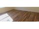 This bedroom features hardwood floors, perfect for a cozy and inviting space at Tbd Aft Ct # 101, Murrells Inlet, SC 29576