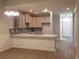Stylish kitchen boasts modern cabinets, a mosaic backsplash, and a spacious countertop with sink at Tbd Aft Ct # 101, Murrells Inlet, SC 29576