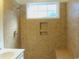 Tiled shower with a built-in bench and niche, providing a spa-like experience at Tbd Aft Ct # 101, Murrells Inlet, SC 29576